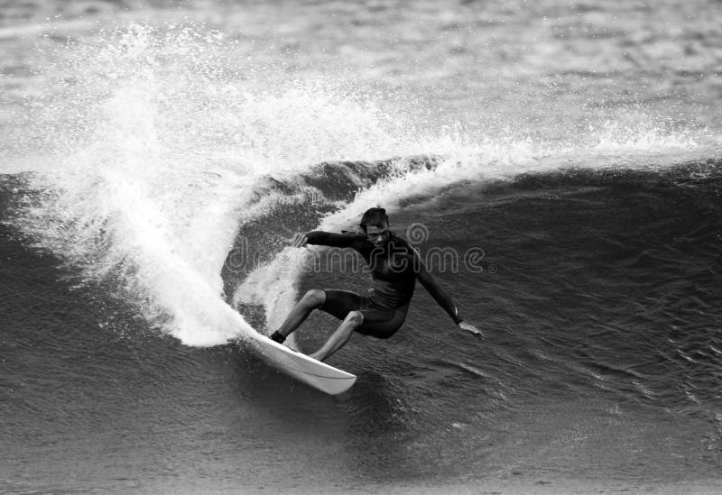 Black and White photo of surfer, Shane Beschen surfing at Rocky Point on the North Shore of Oahu, Hawaii. Black and White photo of surfer, Shane Beschen surfing at Rocky Point on the North Shore of Oahu, Hawaii.