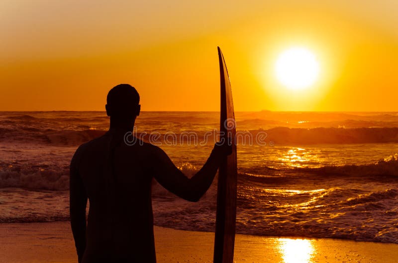 Surfer watching the waves stock image. Image of horizons - 26488229