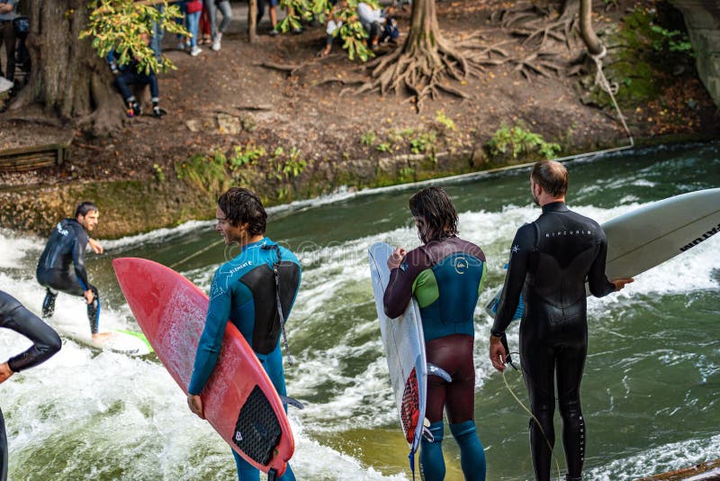 Surfing on the Eisbach River Englischer Garten Munich Germany