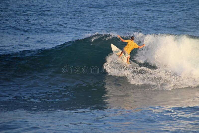 Local surfer in the wave, El Zonte beach, El Salvador, Central America. Local surfer in the wave, El Zonte beach, El Salvador, Central America