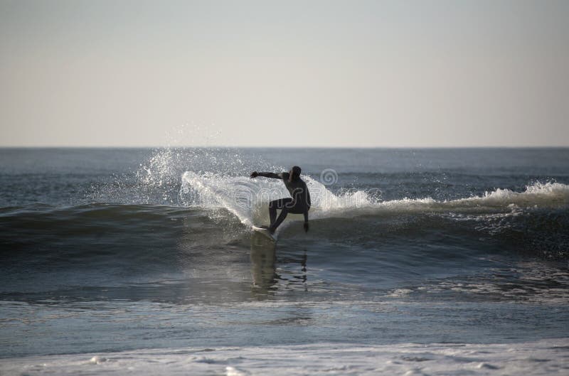 Surfer in the wave with reflex. Surfer in the wave with reflex