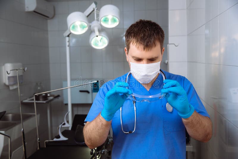 Surgeon Holding Medical Instruments in Hands. Concept of a Healthy