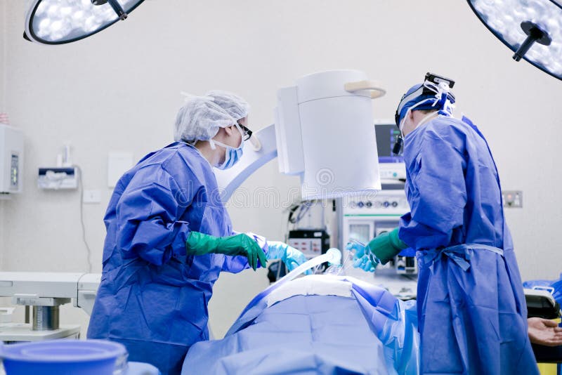 Surgeon and nurse royalty free stock images