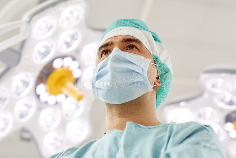 Surgeon in operating room at hospital stock image Surgeon in operating room at hospital stock image