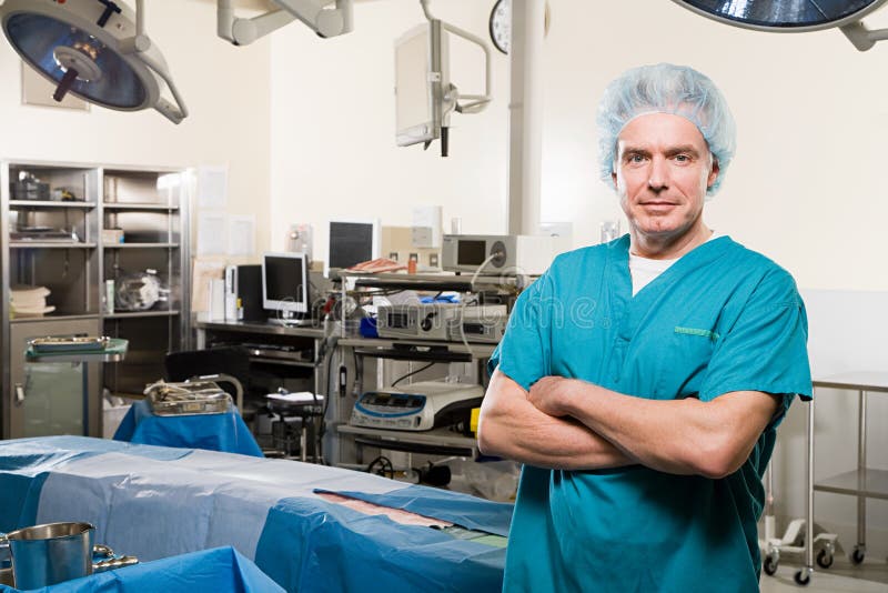 Surgeon in operating theatre stock image