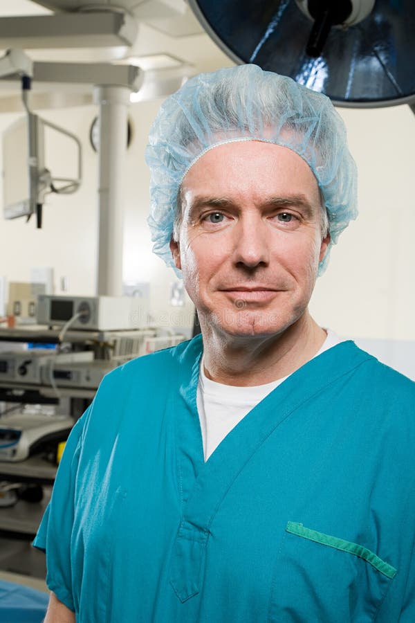 Surgeon in operating theatre stock images