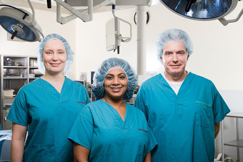 Surgeons in operating theatre royalty free stock photo