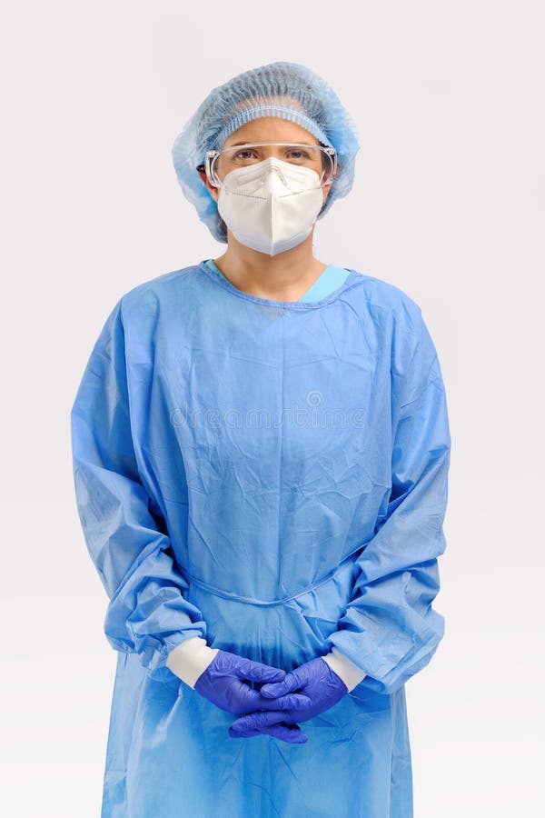 Surgery doctor or researcher with full protective cloth of PPE gown face mask cap and surgery glove isolated on white background