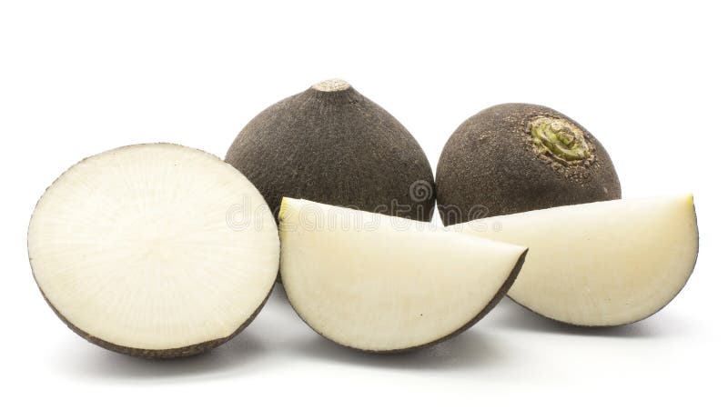 Sliced black radish stack isolated on white background two whole bulbs one fresh cut half and two slices. Sliced black radish stack isolated on white background two whole bulbs one fresh cut half and two slices