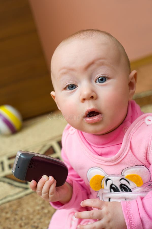 Surprised Baby with Cell Phone Stock Photo Image of caucasian, short