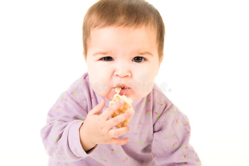 Surprised baby eating