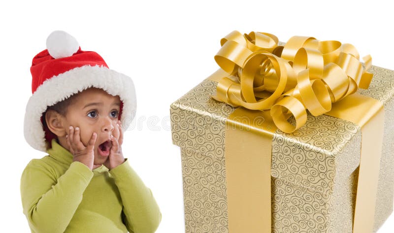 Surprised baby girl with one gift of Christmas stock images Surprised baby girl with one gift of Christmas stock images