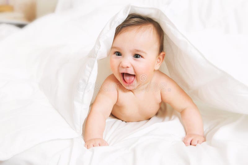 Naked Surprised Baby-girl Lying Stock Image - Image of 