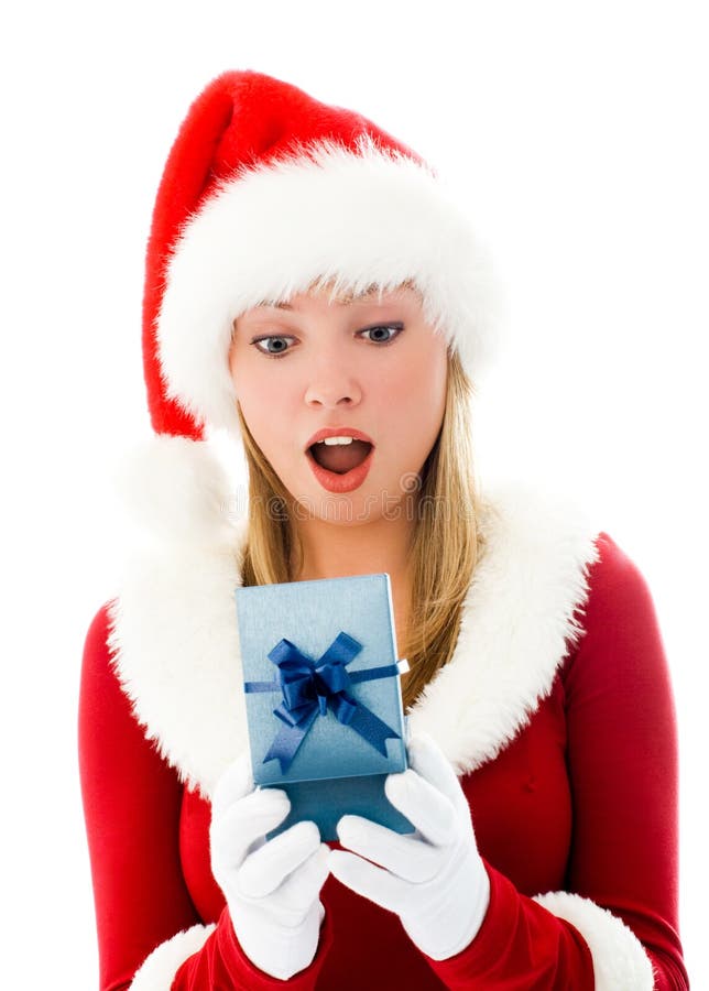 Surprised girl opening a Christmas present