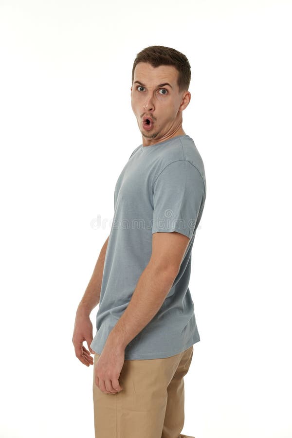 surprised guy looking at camera on white background stock photos