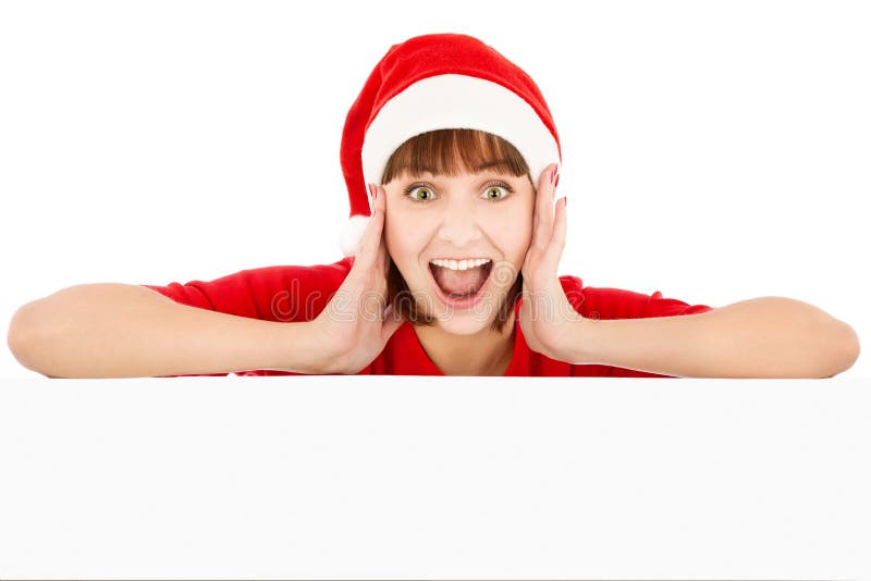 Surprised Santa woman leaning on billboard