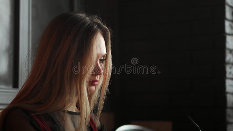 Surprised woman face looking at laptop screen. Close up of excited woman watch online news at computer. Portrait of