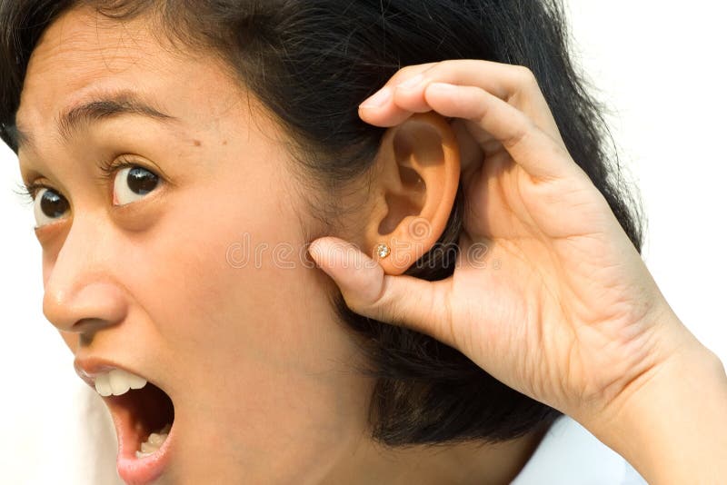 Surprised woman listening to gossip