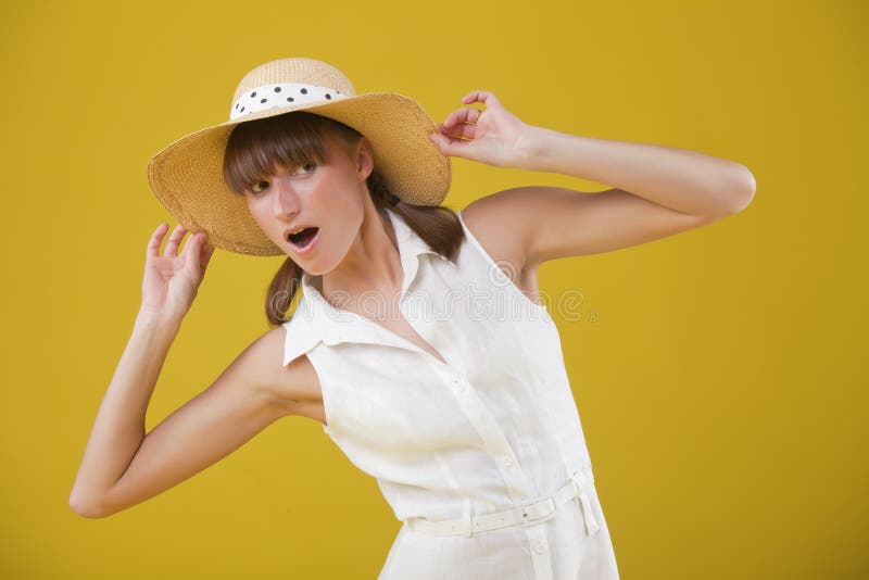 Surprised woman in summer hat