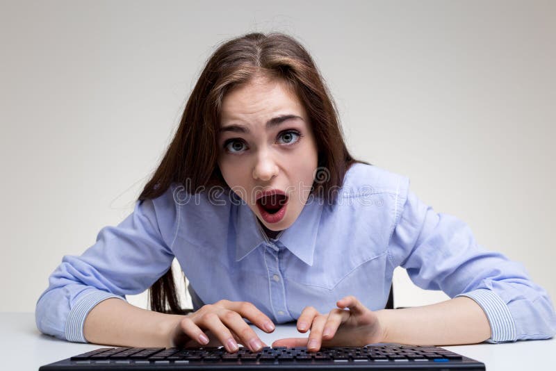 Surprised woman using keyboard closeup stock images Surprised woman using keyboard closeup stock images
