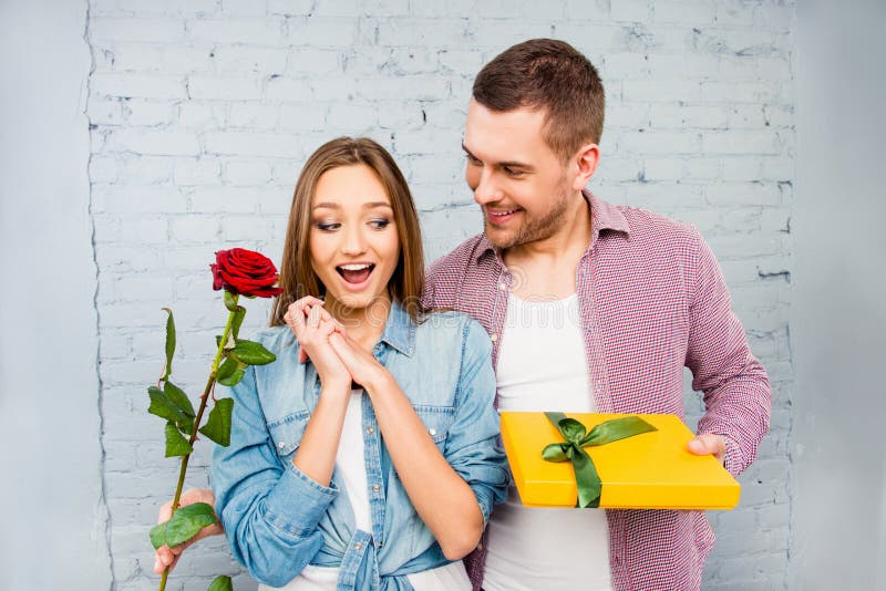 Surprised Young Woman Receiving Gifts from Her Husband Stock Photo ...