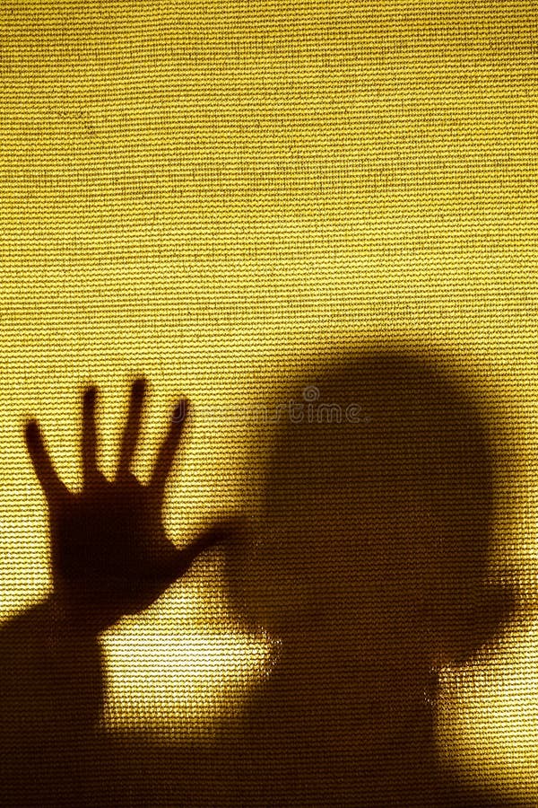 Surreal image of a man trapped behind a fabric. stock photography Surreal image of a man trapped behind a fabric. stock photography