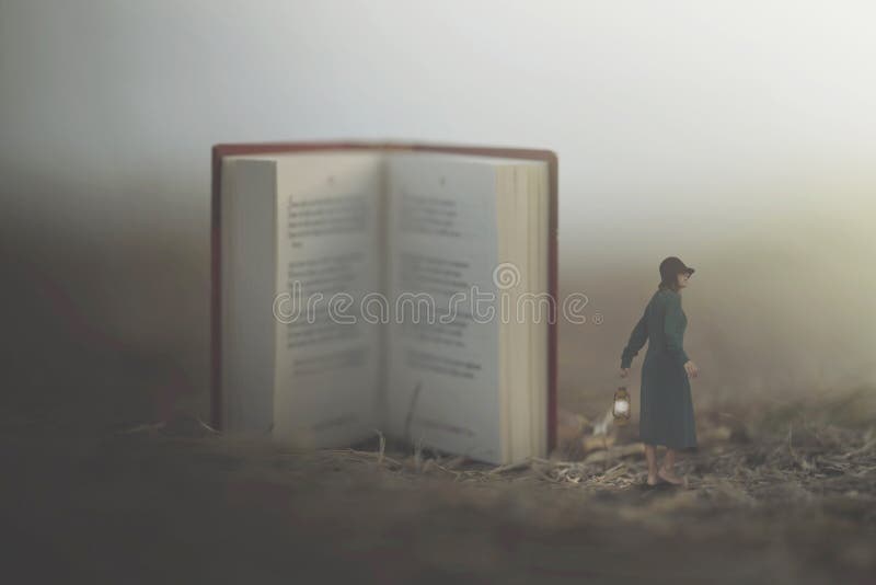 Surreal moment of a woman with lantern walking confused in the fog between giant books stock photo Surreal moment of a woman with lantern walking confused in the fog between giant books stock photo