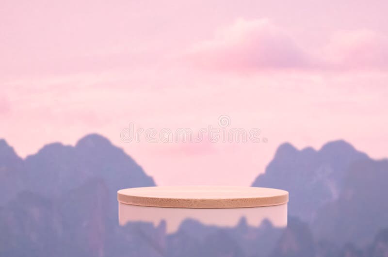 Surreal podium outdoors on sky pink pastel soft cloud with misty mountain nature landscape background.Beauty cosmetic product