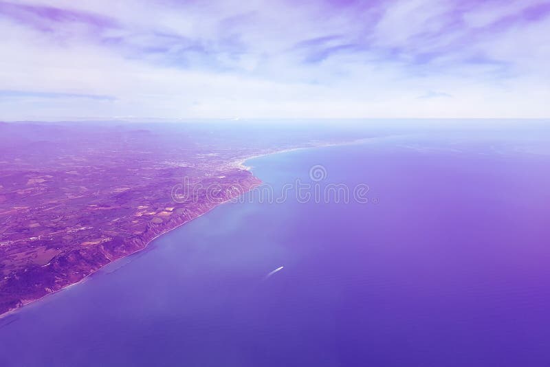 Surreal purple landscape on the sea and shore, view from the plane royalty free stock photo Surreal purple landscape on the sea and shore, view from the plane royalty free stock photo