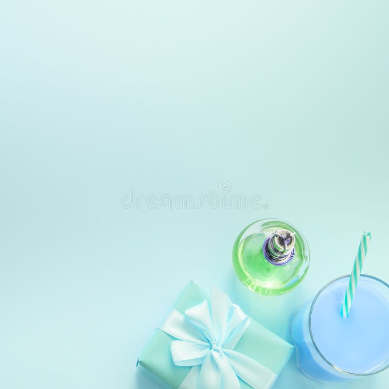 Surrealiam Composition flat lay gift to a woman glass cocktail perfume bouquet of flowers Preparing for the holiday surprise gift stock images Surrealiam Composition flat lay gift to a woman glass cocktail perfume bouquet of flowers Preparing for the holiday surprise gift stock images