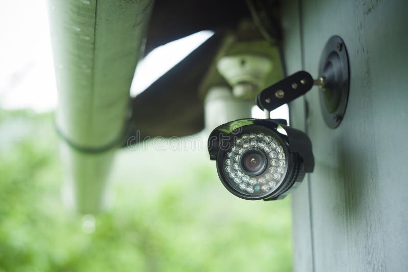Surveillance camera on a house royalty free stock images