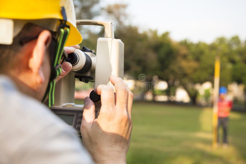 Surveyor engineer with partner royalty free stock images Surveyor engineer with partner royalty free stock images