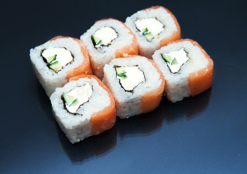 Sushi on black background