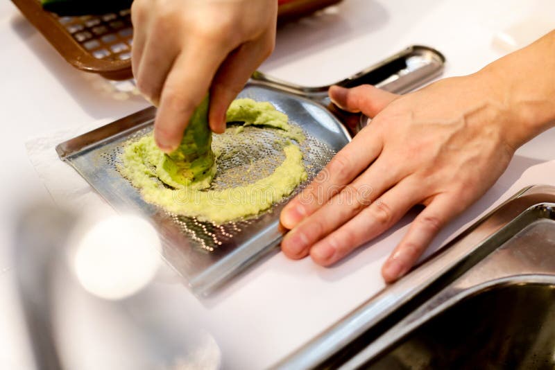 Sushi Chef Grating Fresh Wasabi, Fresh Wasabi Root Prepare for N Stock