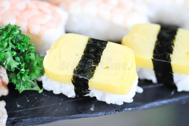 Sushi or Egg Sushi , Rice Topped with Egg and Shrimp Sushi or Steam Egg