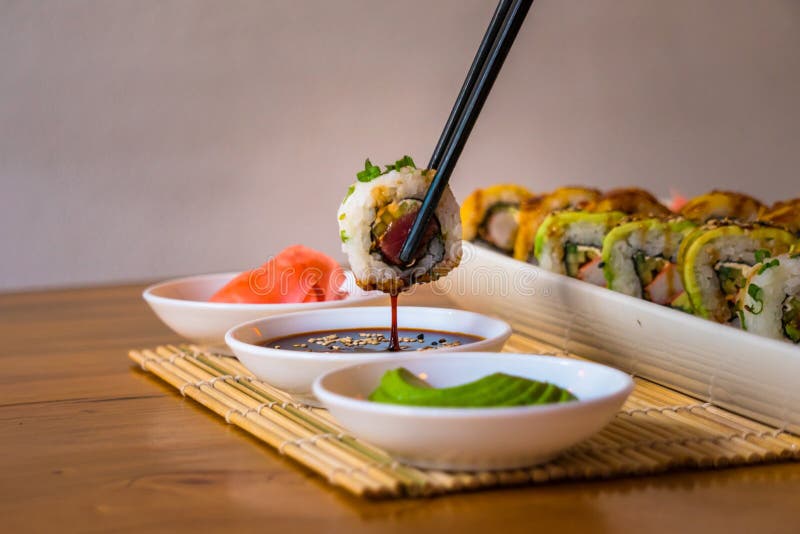 Delicious Sushis, with avocado and white plates royalty free stock photos Delicious Sushis, with avocado and white plates royalty free stock photos
