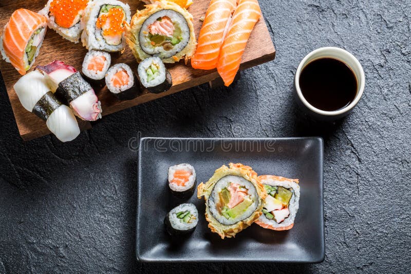 Sushi served with soy sauce