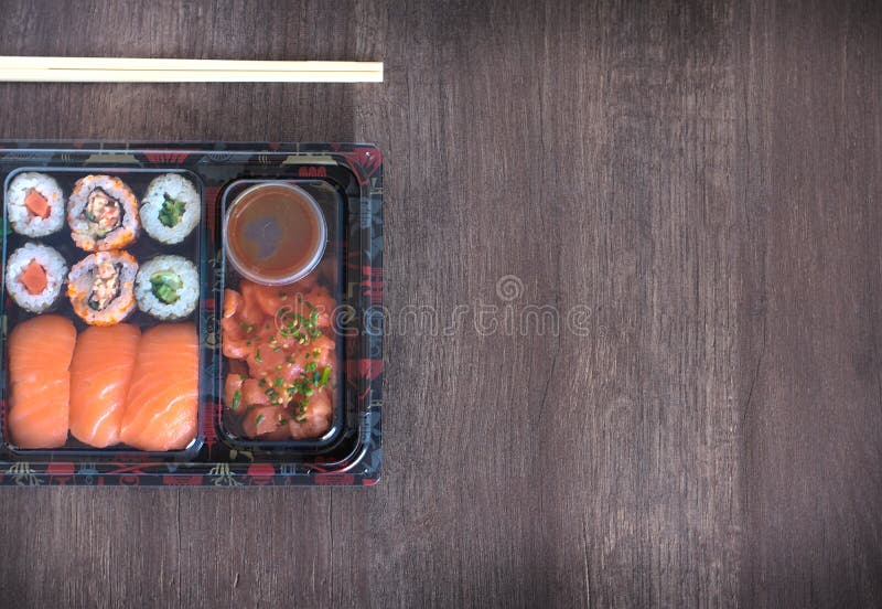 Sushi Tray To Go with Chopsticks Kit, Soy Sauce and Wasabi.Nigiri. Maki.  Sashimi. Salmon. Tuna. Soy. Wakame Stock Photo - Image of fast, delivering:  187683650