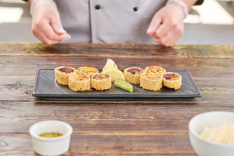 Sushi unagi set on wooden table.