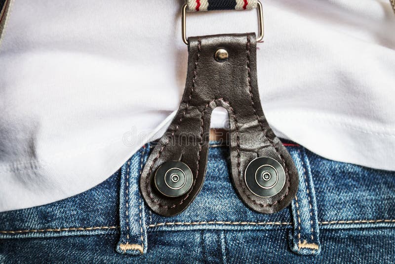 Suspenders With Big Buttons On Jeans On Female Body Stock Photo ...