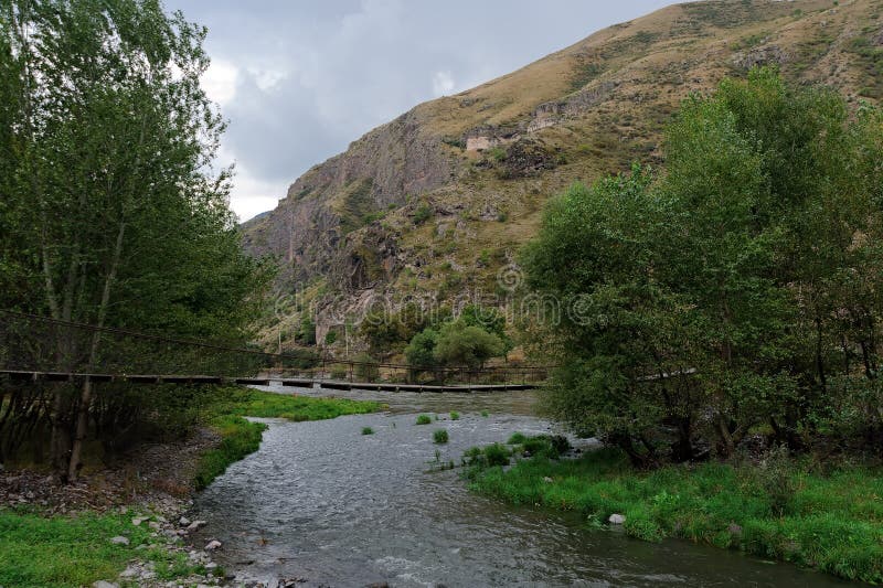 Suspension Bridge in Stock Photo Image of meadow, khertvisi