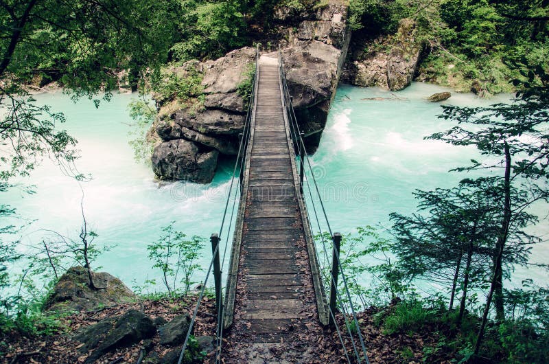Suspension bridge over Soca river, popular outdoor destination, Soca Valley, Slovenia, Europe royalty free stock photography Suspension bridge over Soca river, popular outdoor destination, Soca Valley, Slovenia, Europe royalty free stock photography
