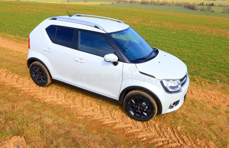 Suzuki Ignis car with 1.2 Dualjet engine. New Suzuki Ignis car with 1.2 Dualjet engine is a Japanese small 4WD crossover for easy ride in city streets and rural royalty free stock photos Suzuki Ignis car with 1.2 Dualjet engine. New Suzuki Ignis car with 1.2 Dualjet engine is a Japanese small 4WD crossover for easy ride in city streets and rural royalty free stock photos