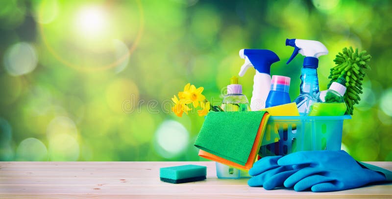 Cleaning concept. Housecleaning. Cleaning supplies on wooden board. Cleaning concept. Housecleaning. Cleaning supplies on wooden board