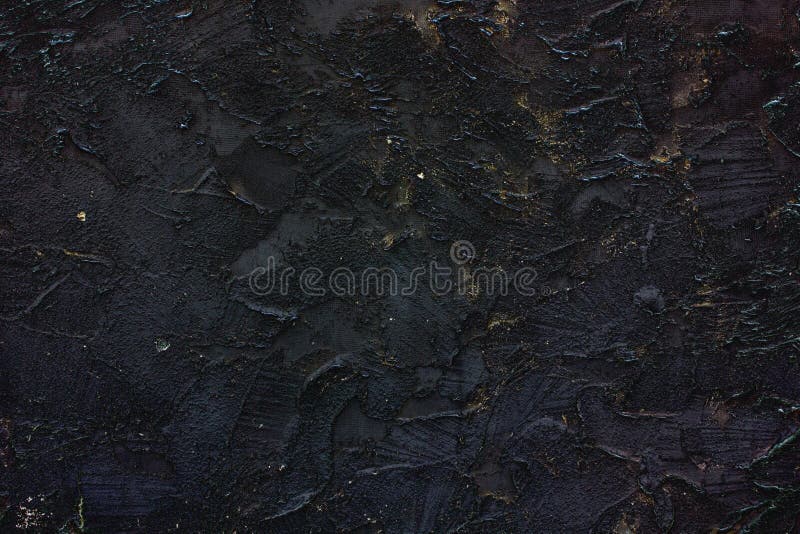 Abstract black texture, vintage old background, black decorative stucco with a splash of gold. Abstract black texture, vintage old background, black decorative stucco with a splash of gold