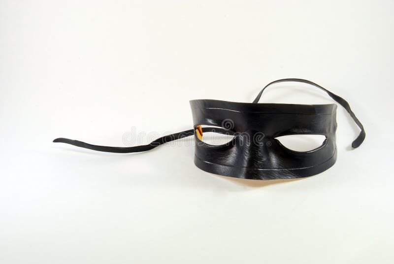 Black leather Lone Ranger type mask on a white background. Black leather Lone Ranger type mask on a white background.