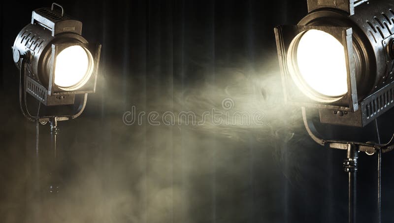 Vintage theater spot light on black curtain with smoke. Vintage theater spot light on black curtain with smoke