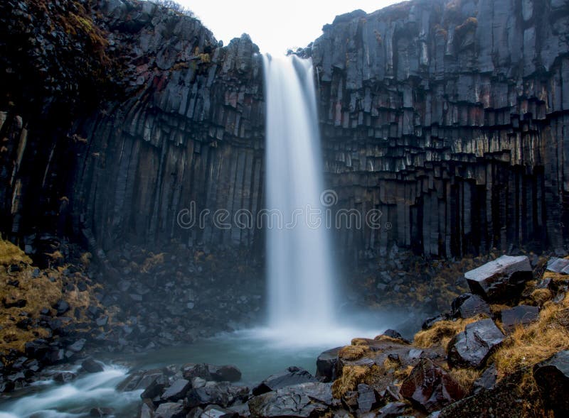 Svartifoss waterfall surrounded by basalt columns stock photography Svartifoss waterfall surrounded by basalt columns stock photography