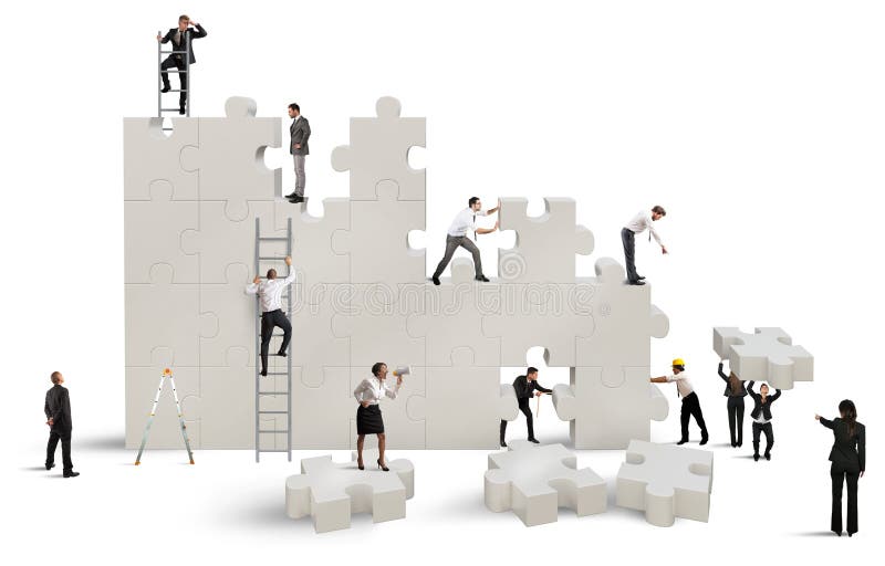 Business team Builds a new company with puzzle. Business team Builds a new company with puzzle