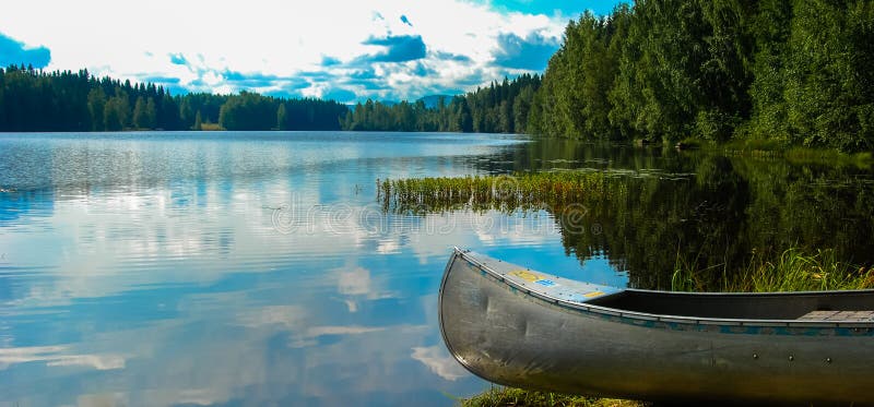 Swedish lake with canoe
